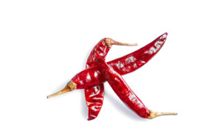 Dried red chili or chilli cayenne pepper isolated on white background Long Pepper